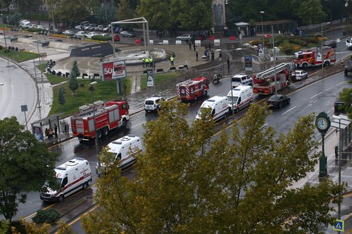 Ambulances and fire trucks are seen outside the Interior Ministry following a bomb attack in Ankara