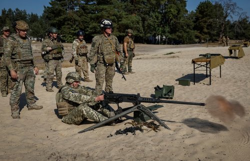 Ukrainian servicemen attend a military exercise in Kyiv region