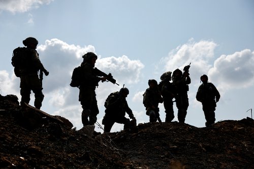 Israeli soldiers gather after the alert of an apparent security incident, in Ashkelon, southern Israel