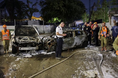 The scene where a rocket fired from Gaza hit in the town of Kiryat Ono