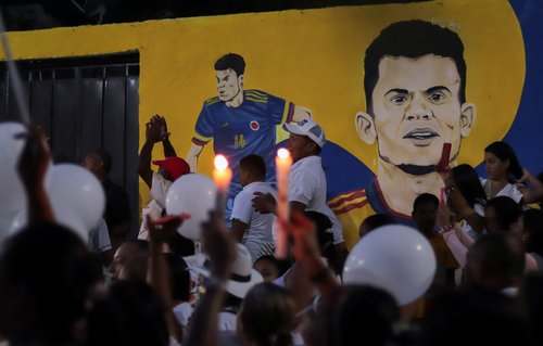 People attend a candlelight vigil for kidnapped father of Liverpool's Luis Diaz, in Barrancas