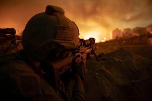 Israeli soldiers take part in an operation in a location given as the Port of Gaza