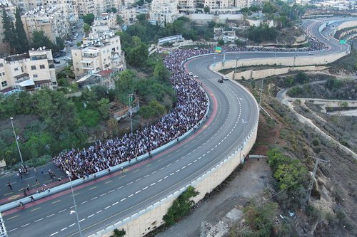 Family members, friends and supporters of Israelis and other nationalities who were taken hostage on October 7 by Palestinian Islamist group Hamas, complete their march into Jerusalem