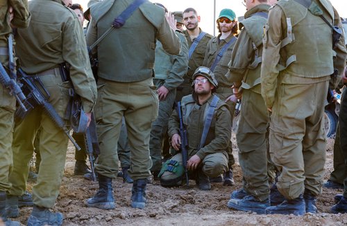 Israeli military operates near the border with Gaza, during a temporary truce between Israel and Palestinian Islamist group Hamas