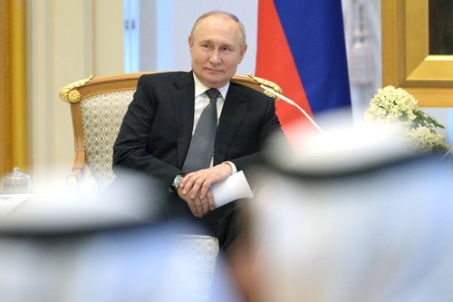 Russian President Vladimir Putin attends a meeting with President of the United Arab Emirates Sheikh Mohamed bin Zayed Al Nahyan in Abu Dhabi