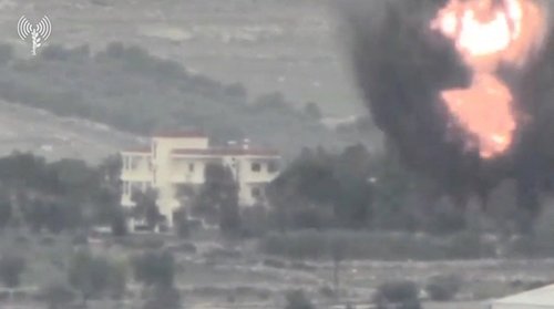 Smoke and fire rise following an Israeli strike on what the Israeli military says are Hezbollah targets in a location given as Lebanon