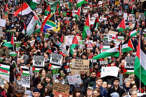 People take part in a protest to mark 100 days since the start of the ongoing Israel-Hamas conflict, in London