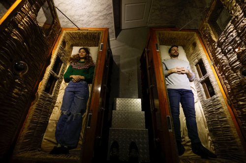 Gamers play an extreme escape room named Catalepsia inside coffins, in Barcelona