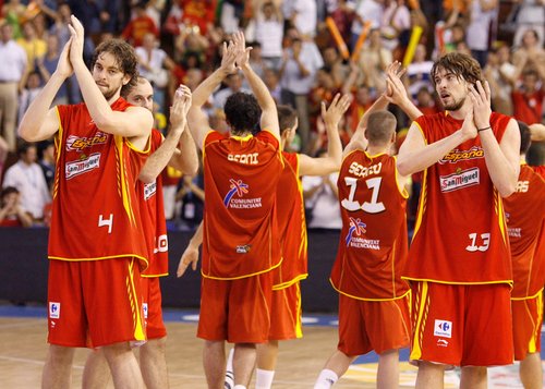 FILE PHOTO: Spain's Pau Gasol and Marc Gasol celebrate after winning against Portugal during their European championship basketball match in Seville