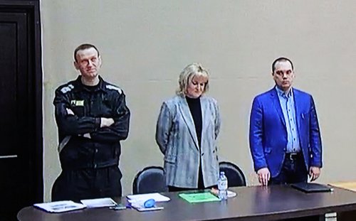 FILE PHOTO: Jailed Russian opposition leader Alexei Navalny attends a court hearing in Pokrov