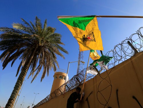 FILE PHOTO: Kataib Hezbollah militia group's flag