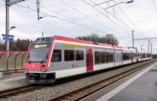 Train passes through the station close to where a man armed held 15 hostages in Essert-sous-Champvent