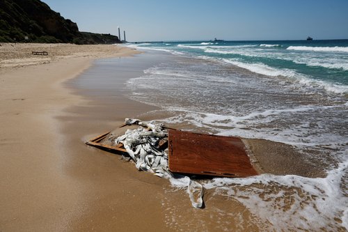 Remains of what appears to be a parachuted crate that had been carrying aid for Gaza, washed up on Israel's shore of the Mediterranean Sea in Ashkelon