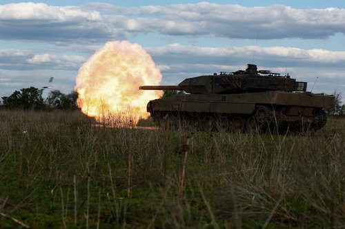Ukrainian servicemen fire a Leopard 2A6 tank during a military exercise in Donetsk region