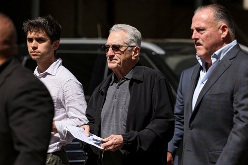 Actor Robert De Niro speaks during a news conference outside Trump trial in New York