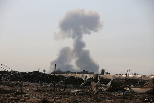 Smoke rises following Israeli strikes, in Khan Younis