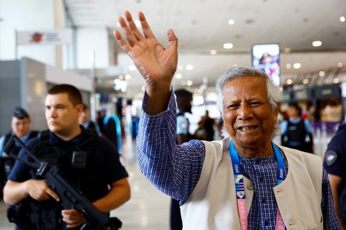 Nobel laureate Muhammad Yunus arrives at Paris Charles de Gaulle airport in Roissy-en-France