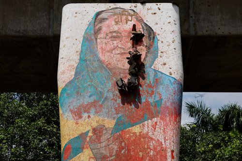 FILE PHOTO: Vandalised mural of Bangladeshi PM Hasina after her resignation, in Dhaka