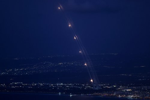 Israel's Iron Dome anti-missile system operates for interceptions as rockets are launched from Lebanon towards Israel, as seen from Haifa