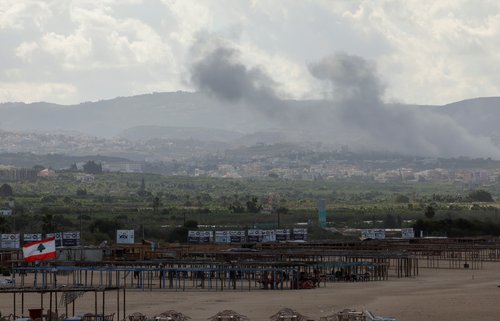 Smoke billows amid the ongoing hostilities between Hezbollah and Israeli forces, as seen from Tyre
