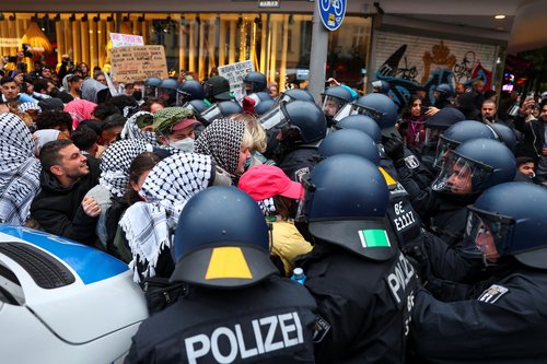 Protesters attend a demonstration in support of Palestinians, in Berlin