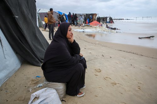 Heavy rains and rising sea levels flood the tents of displaced Palestinians in Gaza's Khan Younis