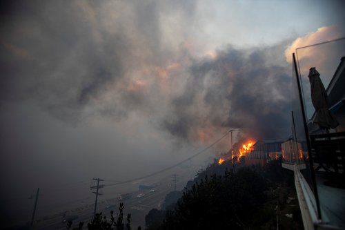 Palisades Fire burns during a windstorm on the west side of Los Angeles