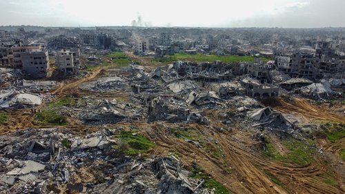 A drone view shows houses and buildings lying in ruins, following a ceasefire between Israel and Hamas, in the northern Gaza Strip