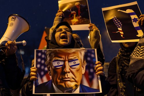 Demonstrators protest against U.S. President Donald Trump's plan to resettle Palestinians from Gaza in Istanbul