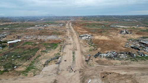A drone view shows buildings lying in ruins after Israeli forces withdrew from the Netzarim Corridor, amid a ceasefire between Israel and Hamas, near Gaza City