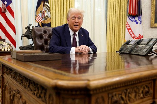 FILE PHOTO: U.S. President Trump signs an executive order in the Oval Office, at the White House