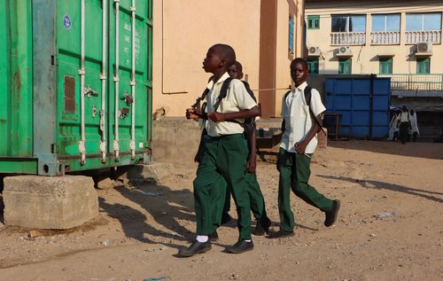 Children walk to the Malaika Primary School in Juba