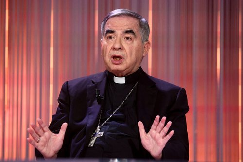 FILE PHOTO: Cardinal Angelo Becciu on the set of talk show "Cinque minuti" (Five minutes) in Rome