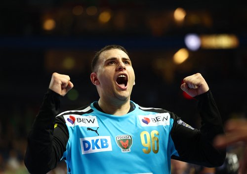 Handball - EHF Men's Handball Champions League - Semi Finals - Fuchse Berlin v HBC Nantes - Lanxess Arena, Cologne, Germany - June 14, 2025 Fuchse Berlin's Dejan Milosavljev celebrates after the match REUTERS/Leon Kuegeler