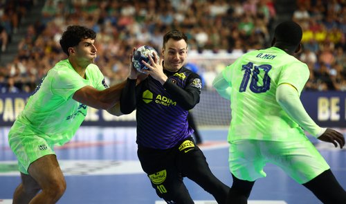 2025-06-15T142810Z_1979552512_UP1EL6F146W1U_RTRMADP_3_HANDBALL-CHAMPIONS