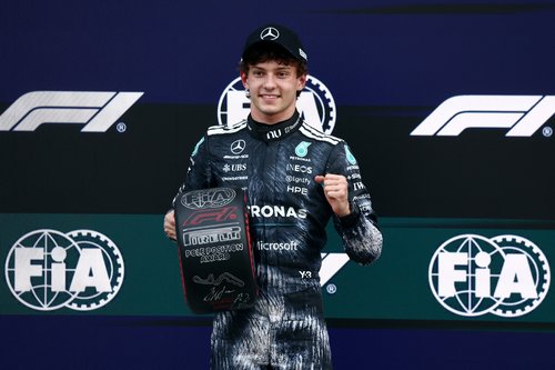 Formula One F1 - Japanese Grand Prix - Suzuka Circuit, Suzuka, Japan - March 28, 2026 Mercedes' Andrea Kimi Antonelli celebrates with the pole position award after qualifying in pole position REUTERS/Jakub Porzycki