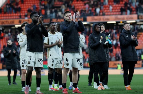 Soccer Football - Ligue 1 - FC Lorient v RC Lens - Stade du Moustoir, Lorient, France - March 14, 2026 RC Lens' Odsonne Edouard and Nidal Celik look dejected after the match REUTERS/Stephane Mahe