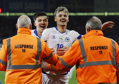 Soccer Football - FIFA World Cup - UEFA Qualifiers - Semi Final - Wales v Bosnia and Herzegovina - Cardiff City Stadium, Cardiff, Wales, Britain - March 26, 2026 Bosnia and Herzegovina's Kerim Alajbegovic celebrates with teammates after scoring a penalty