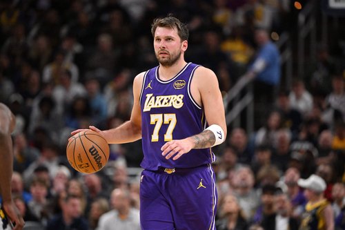 Mar 25, 2026; Indianapolis, Indiana, USA; Los Angeles Lakers guard Luka Doncic (77) dribbles the ball down court during the second half against the Indiana Pacers at Gainbridge Fieldhouse. Mandatory Credit: Marc Lebryk-Imagn Images