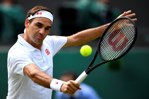 FILE PHOTO: FILE PHOTO: Switzerland's Roger Federer in action during his third round match at Wimbledon