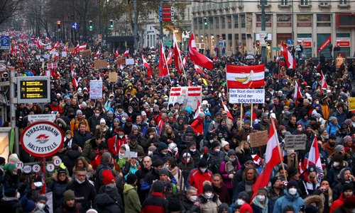 People protest against coronavirus restrictions and the vaccine mandate in Vienna