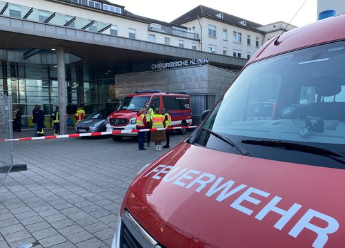 Police and firefighters secure the area at the premises of the Heidelberg university