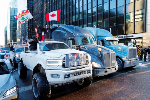 Truckers take part in a convoy and protest against COVID-19 vaccine mandate in Ottawa