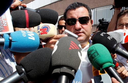 FILE PHOTO: Soccer agent Mino Raiola speaks to the media as he arrives at FC Barcelona's office in Barcelona