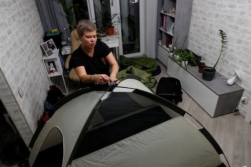 Ukrainian travel enthusiast employs her outdoor skills and camping equipment to prepare for power and water cuts