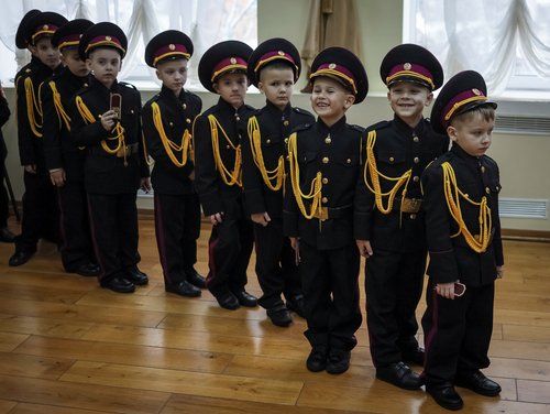 Young military cadets attend a ceremony of receiving shoulder marks in Kyiv