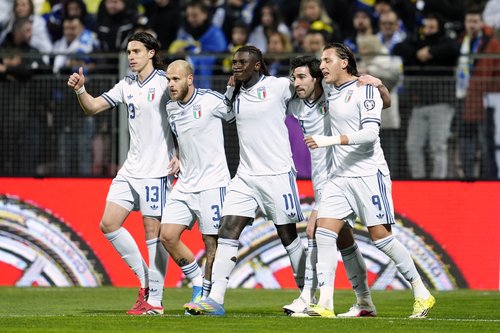 Soccer Football - FIFA World Cup - UEFA Qualifiers - Finals - Bosnia and Herzegovina v Italy - Bilino Polje Stadium, Zenica, Bosnia and Herzegovina - March 31, 2026 Italy's Moise Kean celebrates scoring their first goal with Riccardo Calafiori, Federico D