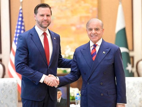 Pakistan's Prime Minister Shehbaz Sharif shakes hands with U.S. Vice President JD Vance during their meeting