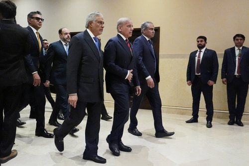 Pakistani Deputy Prime Minister and Foreign Minister Mohammad Ishaq Dar, Pakistan's Prime Minister Shehbaz Sharif, and Pakistan's Interior Minister Mohsin Naqvi, arrive for a meeting with U.S. Vice President JD Vance in Islamabad