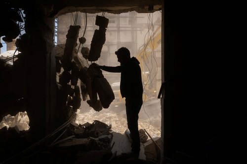 A man stands inside his house damaged during Israeli strikes on Wednesday, in Ain Al Mraiseh, Beirut, Lebanon, April 10, 2026. REUTERS/Adnan Abidi